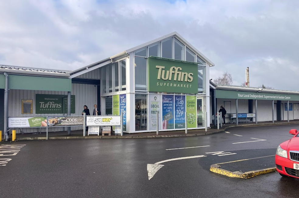 Tuffins supermarket entrance and storefront.